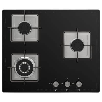 Black glass gas stove with 3 burners, round and square-shaped, controlled by front knobs.