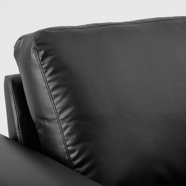 Sofa with clean lines and bolster cushions.