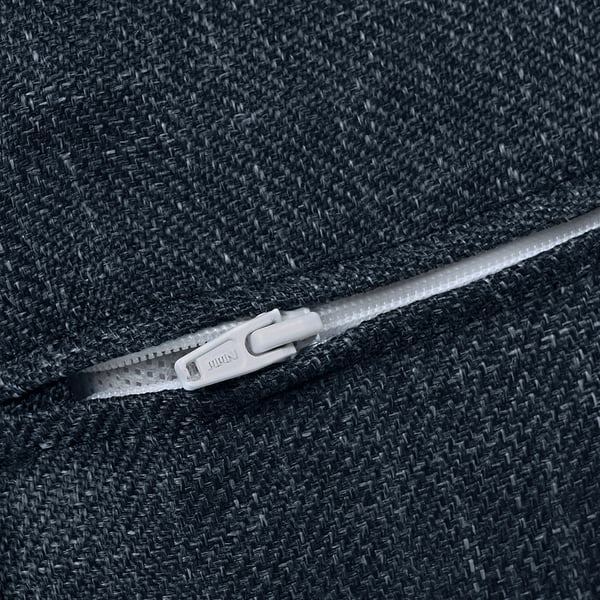 Close-up of durable zip on high-quality, textured fabric.