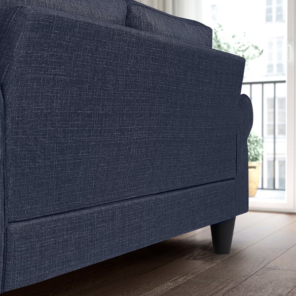Dark blue sofa bed with under-seat storage, ideal for small spaces.