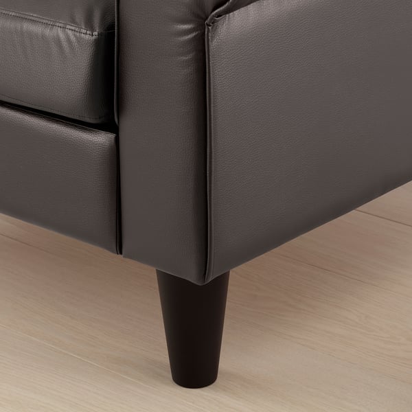 Corner sofa with cushions.