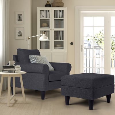 Cosy corner with GAMMALBYN footstool & chair, side table, bookcase, french door.