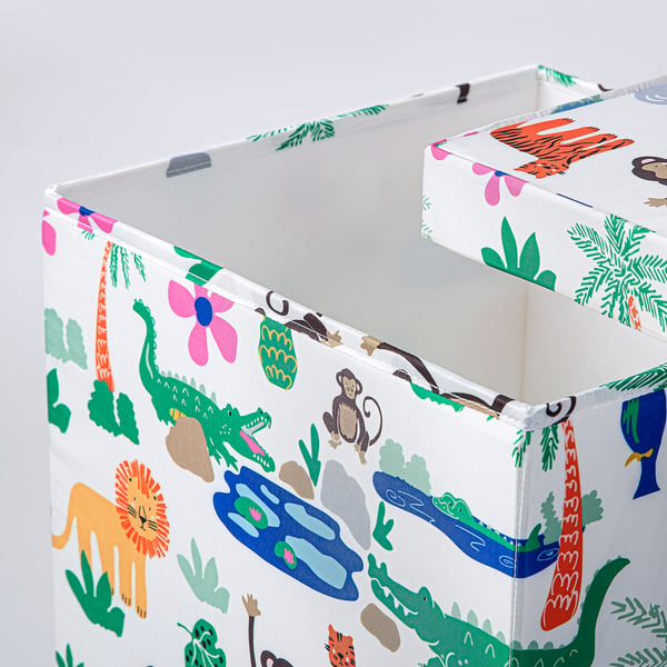 Colourful, durable storage box with playful jungle animal prints, made from recycled fabric.