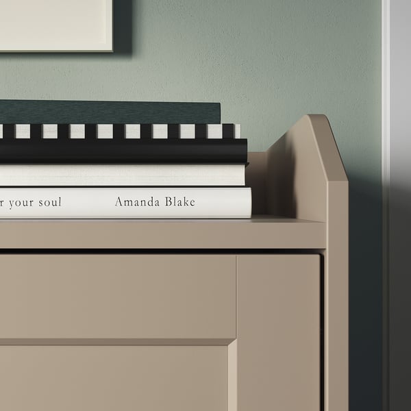 Modern sideboard with two books on top, black and white.