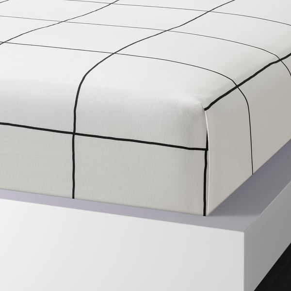 White bed sheet with black bold check pattern. Soft cotton, thread count 152, envelope pillowcases.