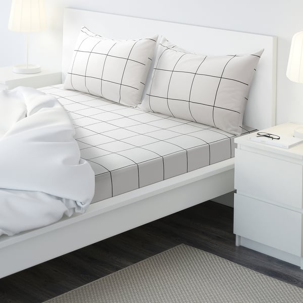 A JÄMTSTARR white bedding set with black checks, 100% cotton, modern design.