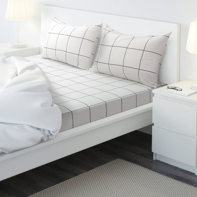 A JÄMTSTARR white bedding set with black checks, 100% cotton, modern design.