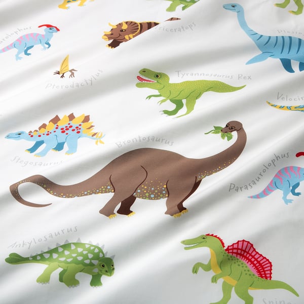 Illustrated dinosaur bed sheets in vibrant colours on soft cotton-viscose blend, showcasing various dinosaurs, educational names, and playful scenes.