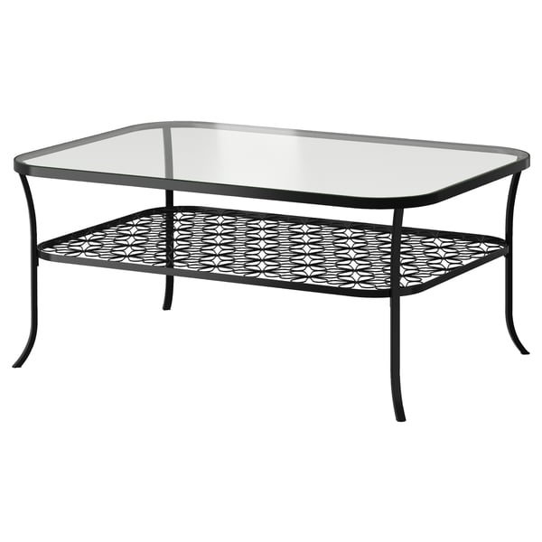 KLINGSBO glass coffee table, sleek black metal frame, lower wire shelf, geometric design.
