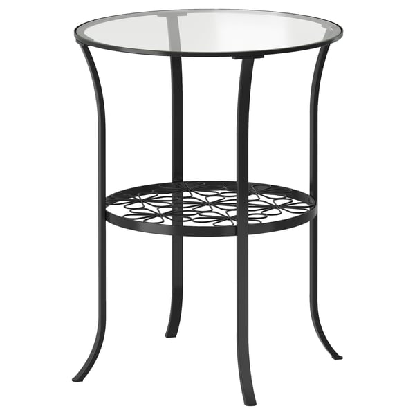 KLINGSBO side table: black steel base with curved legs, glass top, floral shelf.