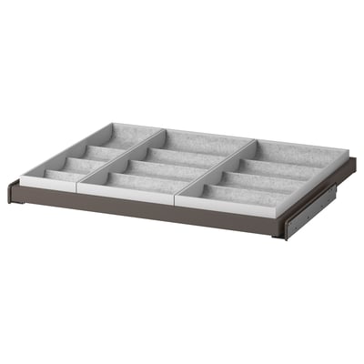 An IKEA KOMPLEMENT pull-out organiser tray in grey for storing accessories.