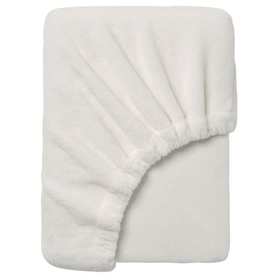 White recycled polyester blanket, neatly folded, soft and fluffy fleece.