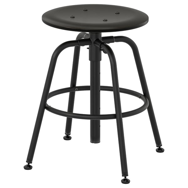 A KULLABERG black metal adjustable stool with a round seat. Its design includes a footrest ring and height-adjustable base.