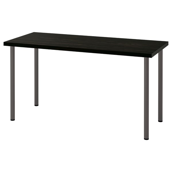 A LAGKAPTEN desk with a black table top and grey metal legs. Its rectangular, modern, and designed for easy assembly.