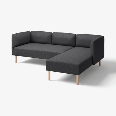A modern dark grey modular sofa named LILLEHEM, featuring wooden legs, wide cushions, and a cosy, inviting design.