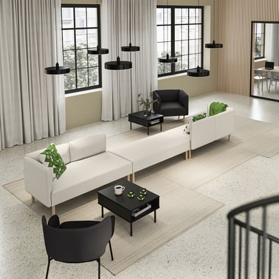 Modern living space with a LILLEHEM modular sofa in white, black coffee tables, and black pendant lights. Large windows with curtains.