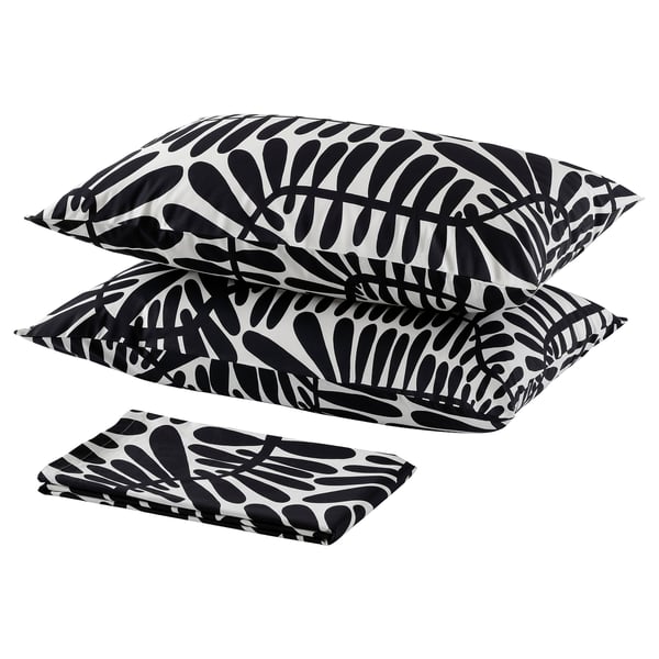 Leaf-patterned pillows & folded sheet, MAJSMOTT bedding set.