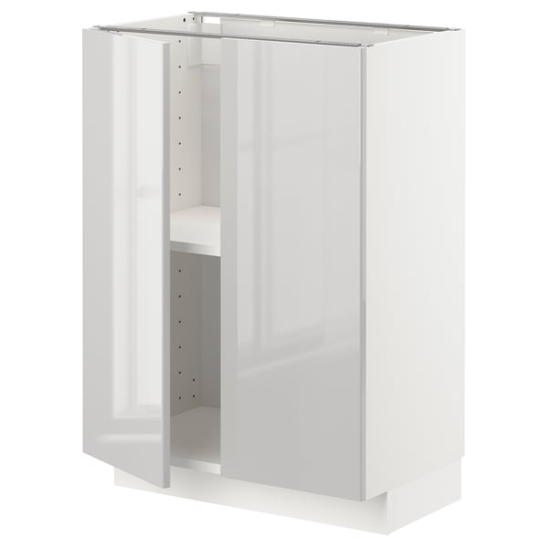 White METOD kitchen cabinet with modern glossy finish and adjustable shelves.
