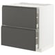 Modern kitchen cabinet in dark grey with sleek handles, featuring two deep drawers on right.