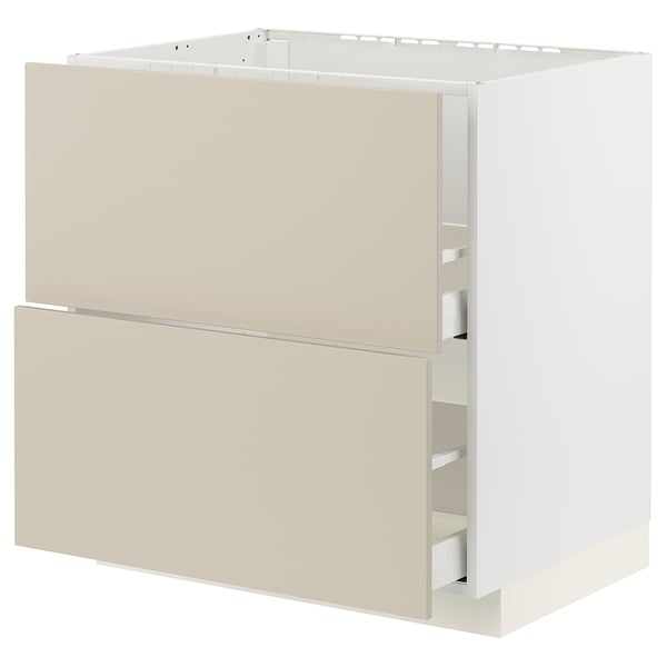 A beige METOD kitchen cabinet with two drawers. The cabinet has a smooth finish and is rectangular in shape.