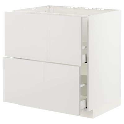 A white METOD kitchen cabinet with a smooth, modern design and a built-in drawer system.