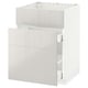 White METOD kitchen cabinet with glossy drawer and high gloss finish.