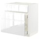 White METOD kitchen cabinet with high gloss finish and integrated handles.