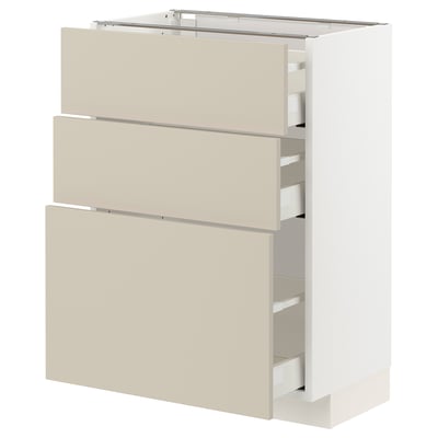 White METOD kitchen cabinet with beige drawers and smooth, clean design.