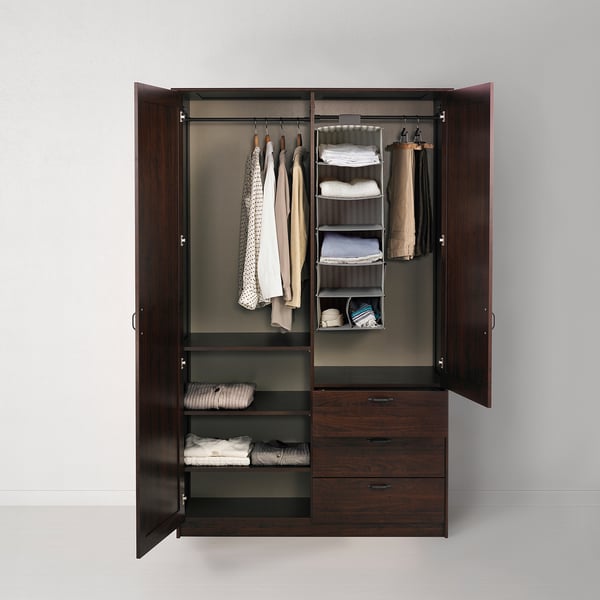 Open wardrobe with clothes, folded items, and shelves. Adjustable shelves, soft-close doors, and a lockable drawer.