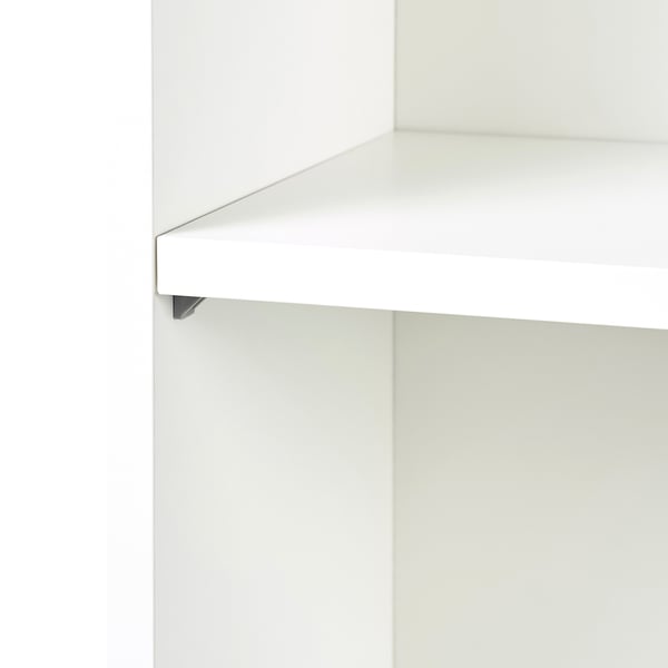 White NODELAND bookcase corner detail, showing sleek, clean finish.