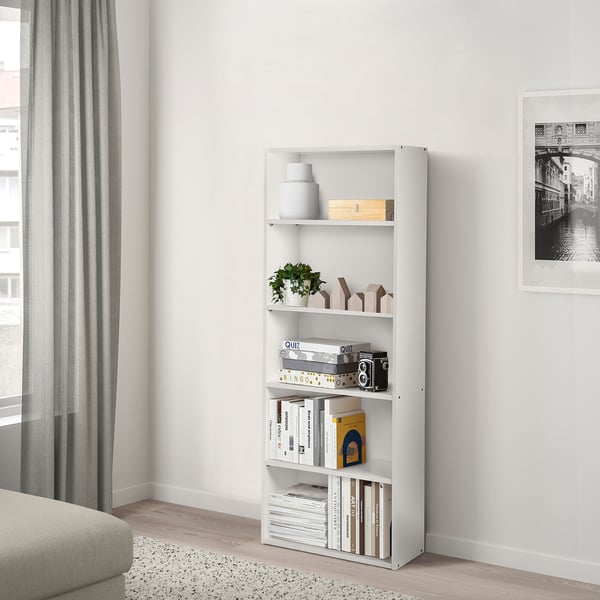 White bookcase: NODELAND, shallow shelf, multiple adjustable shelves, fits tight spaces.