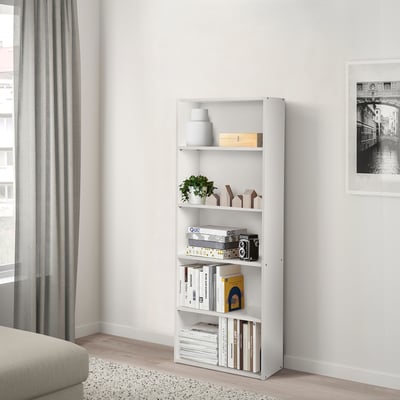 White bookcase: NODELAND, shallow shelf, multiple adjustable shelves, fits tight spaces.