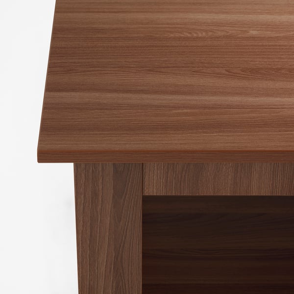 Close-up of a sturdy, well-finished wooden table top with a smooth, even surface and slight wood grain texture.