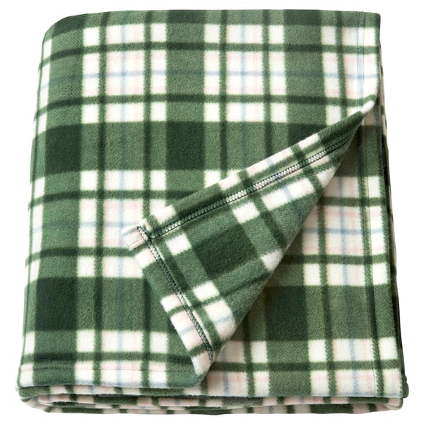 Green and white chequered blanket, rectangular, folded, made of recycled polyester.