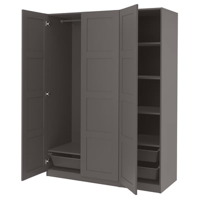 A grey PAX wardrobe with open doors, revealing shelves and storage inside.