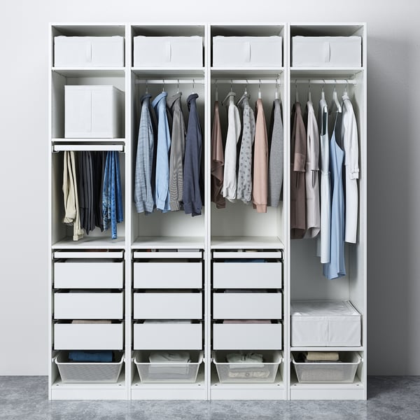 Orgnizer wardrobe with drawers, clothes hangers, boxes, and trays.