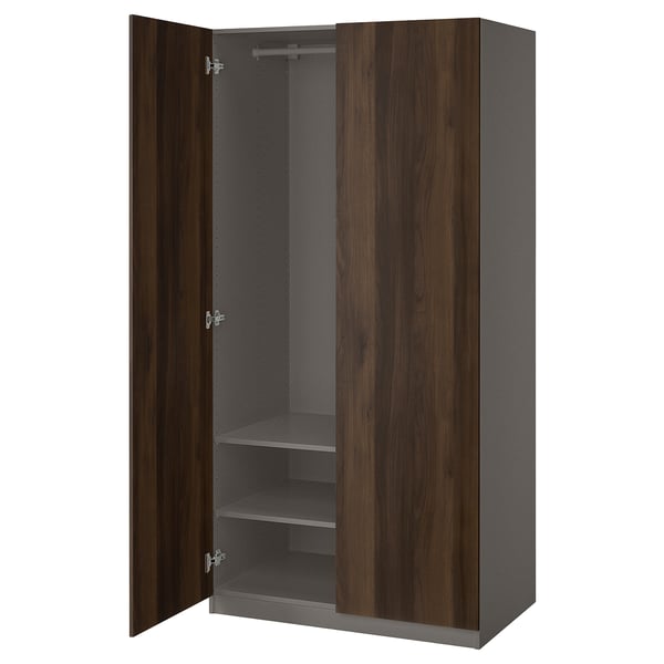 PAX wardrobe, dark-brown, tall, rectangular, with two open doors revealing interior shelves, soft-close hinges.