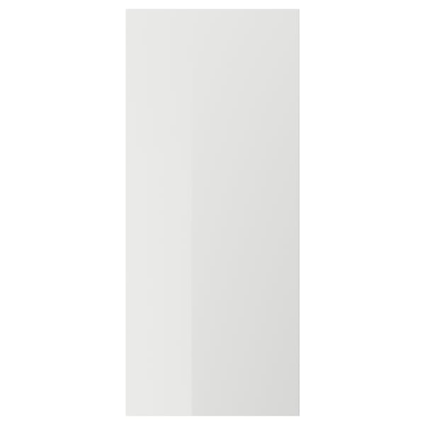 White RINGHULT kitchen cabinet door, glossy and sleek.
