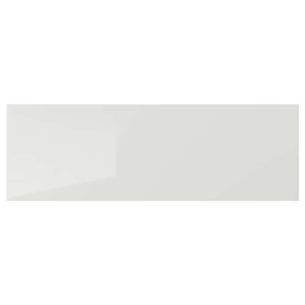 High-gloss grey kitchen drawer, sleek and modern design, made from durable particle board and plastic foil, easy to clean.