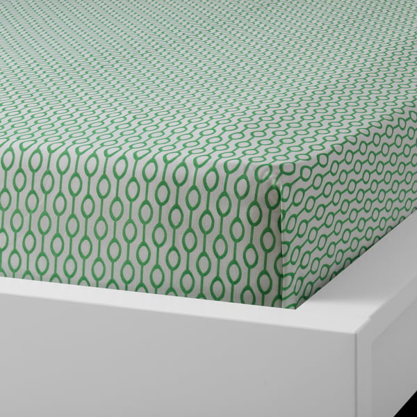 Green-and-white patterned bedsheet on white bed, resistant to wrinkles and shrinkage, made from polyester and cotton blend.