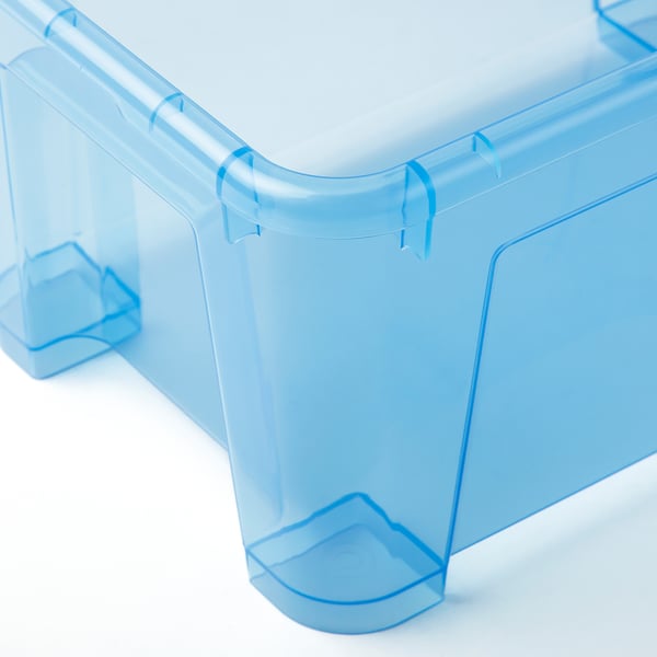 Clear blue plastic container corner, showcasing sturdy, transparent design.