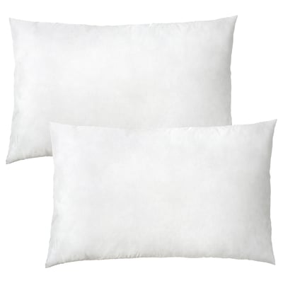 Two white, rectangular pillows with smooth, plump surfaces and simple designs, made of recycled polyester.