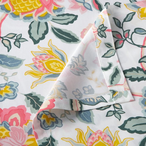 Floral patterned bed sheet with intricate designs, made from soft cotton-viscose blend, partially folded to show texture.