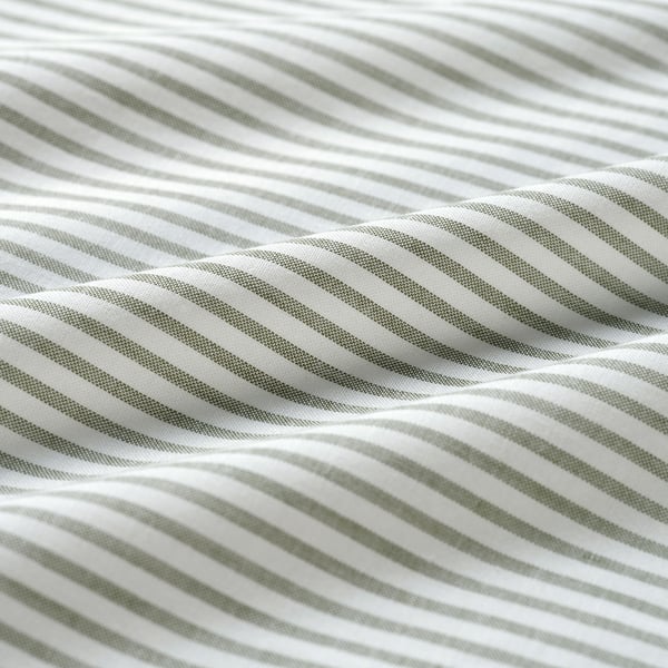 Striped fabric close-up; quality soft cotton, fine stitching visible.
