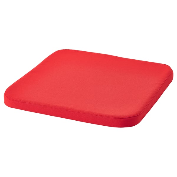 Red rectangular seat cushion with rounded corners. Firm yet comfortable, easy to clean with a zip.