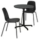 Black dining set: round metal table, stackable chairs with plastic seats.