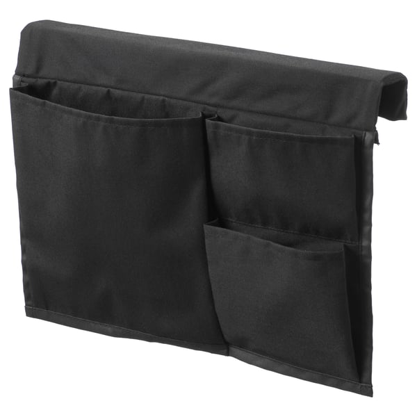 Black fabric storage pocket for bed, three compartments, attaches to bed edge.