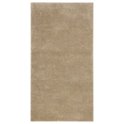 STOENSE rug, neutral beige, soft textured pile, rectangular, minimalist design.