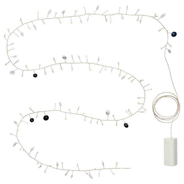 STRÅLA: silver disc string light, battery-powered.