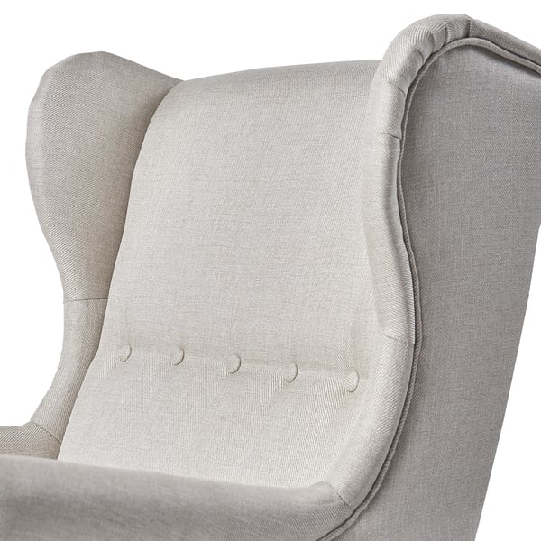A plush, light grey wingback chair with high, supportive backrest and tufted cushion, showcasing comfort and quality.